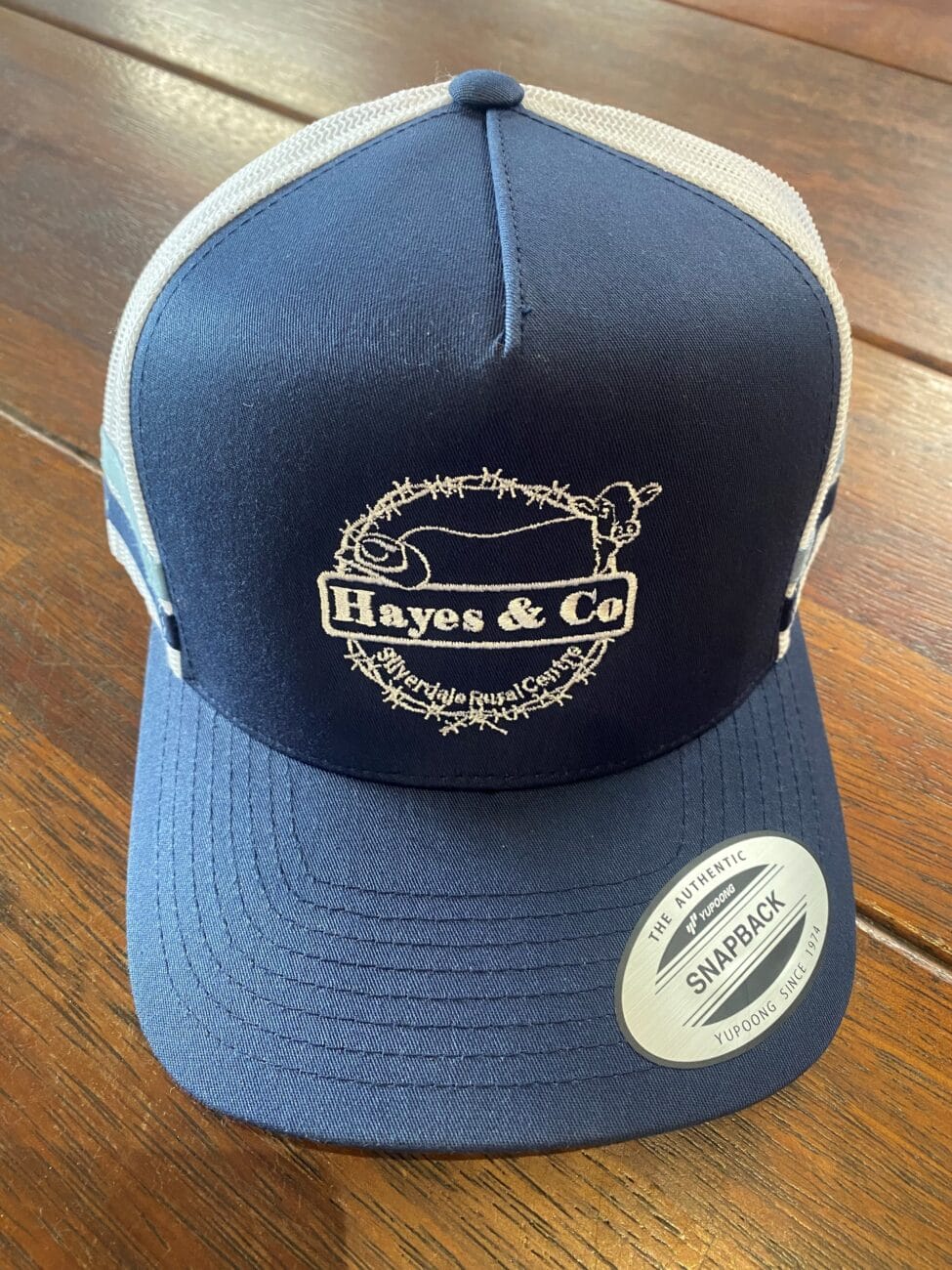 Flexfit Stripe Hayes and Co Trucker Barbed Circle LOGO NAVY/WHITE